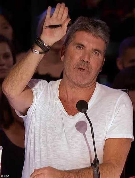 Portada de simon hears such a bad song he has to find the buzzer.